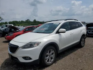 2015 Mazda CX-9 Touring z VIN JM3TB3CA7F0450645, wystawiony jako Copart lot #60904815 z przebiegiem 245 715 mil mil oraz Czysty tytuł • Clean title. Historia ofert i sprzedaży dostępna na DreamBid. Obrazek 1.