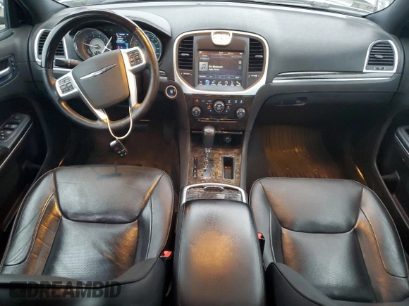 2012 Chrysler 300 C with VIN 2C3CCAKT9CH202809, listed as a Copart auction lot 79215864 with 121,610 mi miles and Salvage Title. Bid and sale history available at DreamBid. Image 8.