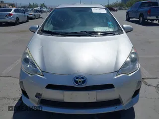 2014 Toyota Prius One with VIN JTDKDTB38E1061202, listed as a IAAI auction lot 42044747 with 133,409 mi miles and . Bid and sale history available at DreamBid. Image 12.
