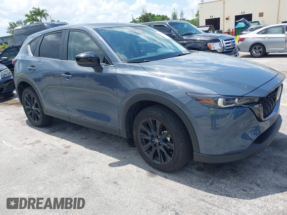 2024 Mazda CX-5 S Carbon Edition z VIN JM3KFBCLXR0521353, wystawiony jako IAAI lot #42351444 z przebiegiem 17 270 mil mil oraz . Historia ofert i sprzedaży dostępna na DreamBid. Obrazek 1.