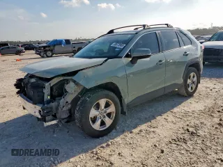 2021 Toyota RAV4 XLE with VIN JTMW1RFV8MD073727, listed as a Copart auction lot 59573985 with 56,161 mi miles and Salvage title. Bid and sale history available at DreamBid. Image 1.