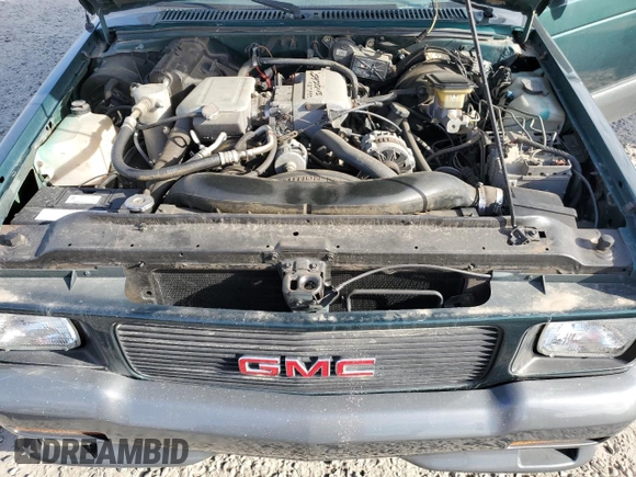 1993 GMC Jimmy z VIN 1GDCT18Z9P0810178, wystawiony jako Copart lot #79442614 z przebiegiem 19 514 mil mil oraz Szkoda całkowita • Salvage title. Historia ofert i sprzedaży dostępna na DreamBid. Obrazek 11.