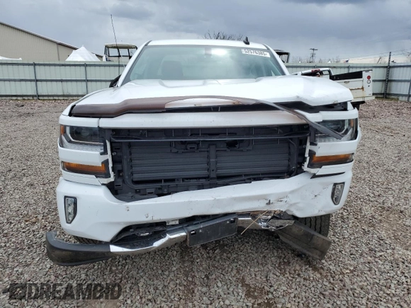 2017 Chevrolet Silverado 1500 LT with VIN 1GCVKREC3HZ216455, listed as a Copart auction lot 52576385 with 73,528 mi miles and Salvage Title. Bid and sale history available at DreamBid. Image 5.