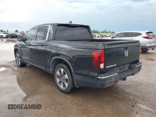 2017 Honda Ridgeline RTL-T with VIN 5FPYK2F64HB003542, listed as a IAAI auction lot 42171243 with 102,071 mi miles and . Bid and sale history available at DreamBid. Image 3.
