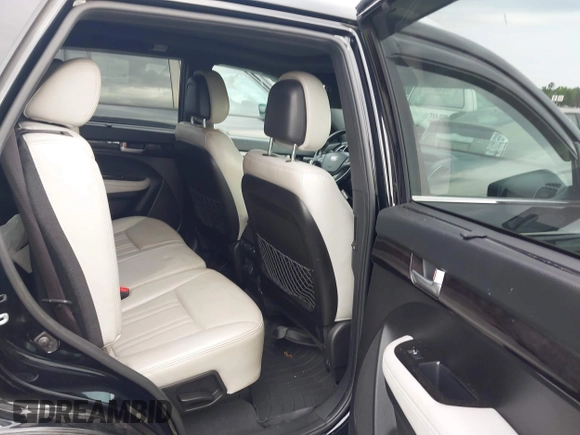 2014 Kia Sorento SX z VIN 5XYKWDA7XEG485405, wystawiony jako IAAI lot #42312938 z przebiegiem 169 728 mil mil oraz . Historia ofert i sprzedaży dostępna na DreamBid. Obrazek 8.