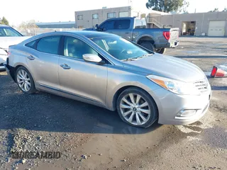 2013 Hyundai Azera with VIN KMHFH4JG3DA230844, listed as a IAAI auction lot 41817997 with 129,163 mi miles. Bid and sale history available at carsss.com. Image 1.