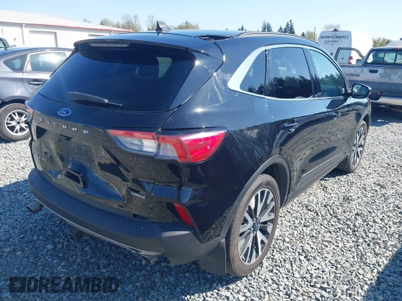 2020 Ford Escape Titanium Hybrid z VIN 1FMCU9DZ9LUC35844, wystawiony jako IAAI lot #42058275 z przebiegiem 74 205 mil mil oraz . Historia ofert i sprzedaży dostępna na DreamBid. Obrazek 4.