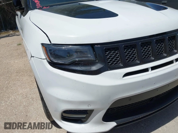 2015 Jeep Grand Cherokee Summit с VIN 1C4RJFJTXFC173287, выставлен на аукционе IAAI как лот 42794100 с пробегом 125 705 миль миль и . История ставок и продаж доступна на DreamBid. Изображение 6.
