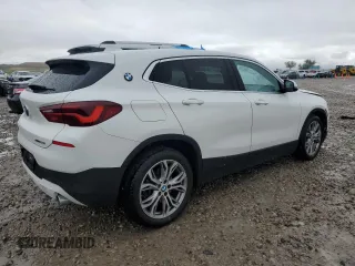 2022 BMW X2 xDrive28i z VIN WBXYJ1C00N5U17584, wystawiony jako Copart lot #55994955 z przebiegiem 21 973 mil mil oraz Czysty tytuł • Clean title. Historia ofert i sprzedaży dostępna na DreamBid. Obrazek 3.