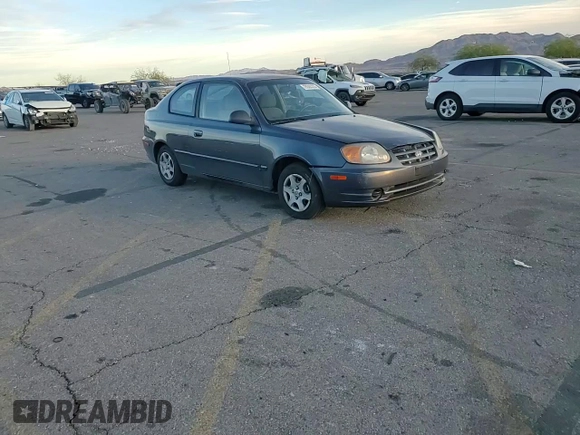 2005 Hyundai Accent GLS with VIN KMHCG35C65U359247, listed as a Copart auction lot 79305324 with 120,985 mi miles and Salvage Title. Bid and sale history available at carsss.com. Image 10.