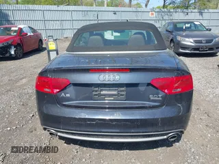 2016 Audi A5 Premium Plus with VIN WAUM2AFH2GN005516, listed as a IAAI auction lot 42181132 with 60,280 mi miles. Bid and sale history available at carsss.com. Image 16.