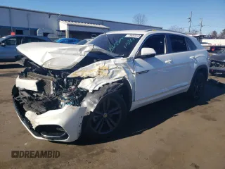 2022 Volkswagen Atlas SEL R-Line с VIN 1V2SE2CAXNC222396, выставлен на аукционе Copart как лот 79693034 с пробегом Не указан миль и Списание • Salvage title. История ставок и продаж доступна на DreamBid. Изображение 1.