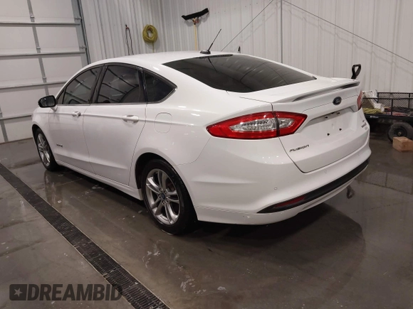 2015 Ford Fusion SE Hybrid with VIN 3FA6P0LU8FR215788, listed as a IAAI auction lot 42038194 with 136,949 mi miles and . Bid and sale history available at DreamBid. Image 3.