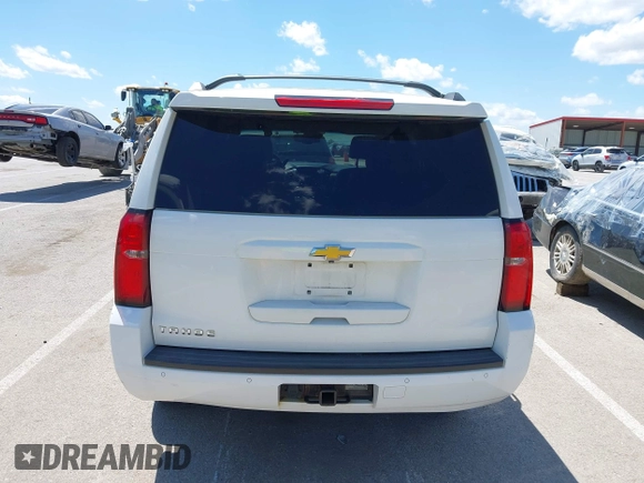 2015 Chevrolet Tahoe LT with VIN 1GNSKBKC8FR194164, listed as a IAAI auction lot 42315215 with 211,797 mi miles and . Bid and sale history available at DreamBid. Image 16.