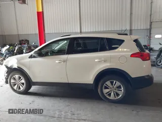 2014 Toyota RAV4 LE with VIN JTMBFREV8EJ005559, listed as a IAAI auction lot 41963080 with 126,296 mi miles and . Bid and sale history available at DreamBid. Image 14.