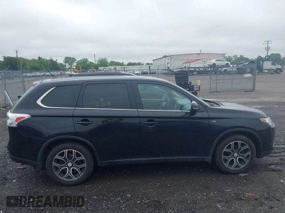 2015 Mitsubishi Outlander GT z VIN JA4JZ4AX8FZ002364, wystawiony jako IAAI lot #42187976 z przebiegiem 144 447 mil mil oraz . Historia ofert i sprzedaży dostępna na DreamBid. Obrazek 13.