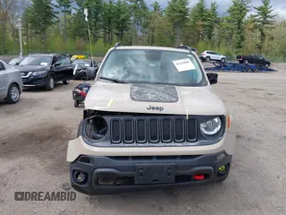 2017 Jeep Renegade Trailhawk z VIN ZACCJBCB8HPE88509, wystawiony jako IAAI lot #42210098 z przebiegiem 114 832 mil mil oraz . Historia ofert i sprzedaży dostępna na DreamBid. Obrazek 13.