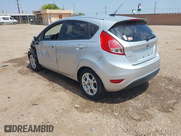 2014 Ford Fiesta SE with VIN 3FADP4EJ4EM151911, listed as a IAAI auction lot 42096321 with 129,938 mi miles and . Bid and sale history available at DreamBid. Image 3.