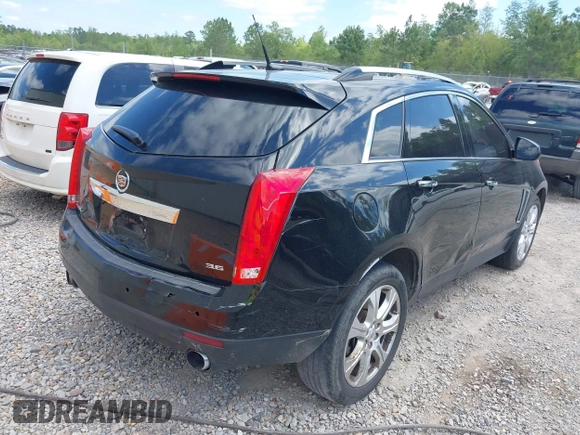 2013 Cadillac SRX Performance Collection z VIN 3GYFNDE35DS555248, wystawiony jako IAAI lot #42001494 z przebiegiem 268 410 mil mil oraz . Historia ofert i sprzedaży dostępna na DreamBid. Obrazek 4.