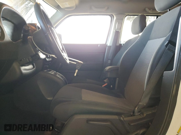 2014 Jeep Patriot Latitude with VIN 1C4NJRFB2ED665093, listed as a Copart auction lot 85868964 with 110,066 mi miles and Salvage title. Bid and sale history available at DreamBid. Image 7.