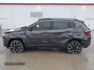 2018 Jeep Compass Limited with VIN 3C4NJDCB4JT115647, listed as a IAAI auction lot 41728750 with 127,290 mi miles and . Bid and sale history available at carsss.com. Image 15.