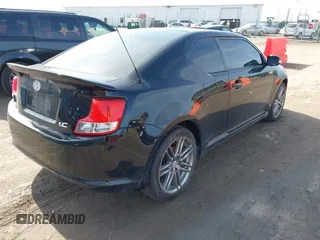 2013 Scion tC with VIN JTKJF5C74D3063012, listed as a IAAI auction lot 41776592 with 142,071 mi miles. Bid and sale history available at carsss.com. Image 4.