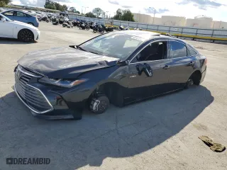 2021 Toyota Avalon Hybrid Limited with VIN 4T1DA1AB7MU001032, listed as a Copart auction lot 48187545 with 73,676 mi miles and Salvage Title. Bid and sale history available at carsss.com. Image 1.