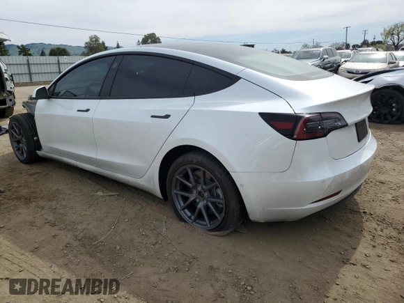 2022 Tesla Model 3 Long Range with VIN 5YJ3E1EB0NF123224, listed as a Copart auction lot 49890205 with 68,594 mi miles and Salvage Title. Bid and sale history available at DreamBid. Image 2.