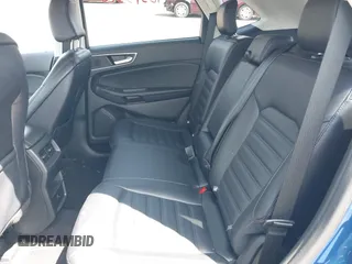 2024 Ford Edge SEL z VIN 2FMPK4J96RBB00933, wystawiony jako IAAI lot #42393326 z przebiegiem 28 710 mil mil oraz . Historia ofert i sprzedaży dostępna na DreamBid. Obrazek 8.