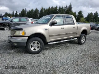 2002 Ford F-150 XLT with VIN 1FTRW08642KC67261, listed as a Copart auction lot 71115404 with 0 mi miles and Salvage Title. Bid and sale history available at carsss.com. Image 1.