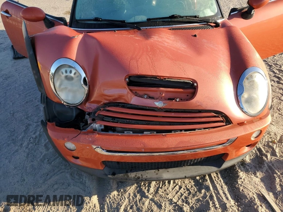 2007 MINI Convertible S with VIN WMWRH33587TJ43499, listed as a Copart auction lot 76266684 with 103,691 mi miles and Salvage title. Bid and sale history available at DreamBid. Image 12.