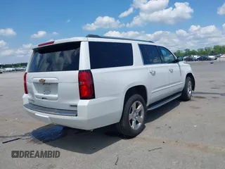 2017 Chevrolet Suburban Premier z VIN 1GNSCJKC5HR139150, wystawiony jako IAAI lot #42125570 z przebiegiem 177 792 mil mil oraz . Historia ofert i sprzedaży dostępna na DreamBid. Obrazek 4.