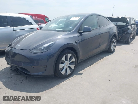 2023 Tesla Model Y Long Range z VIN 7SAYGDEE6PA169168, wystawiony jako IAAI lot #42050428 z przebiegiem 26 731 mil mil oraz . Historia ofert i sprzedaży dostępna na DreamBid. Obrazek 17.