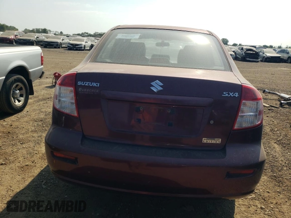 2011 Suzuki SX4 LE with VIN JS2YC5A2XB6302991, listed as a Copart auction lot 68815864 with 82,464 mi miles and Salvage Title. Bid and sale history available at carsss.com. Image 6.