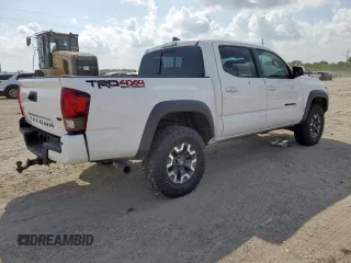 2018 Toyota Tacoma SR z VIN 3TMCZ5AN0JM178886, wystawiony jako Copart lot #56330495 z przebiegiem 71 962 mil mil oraz Szkoda całkowita • Salvage title. Historia ofert i sprzedaży dostępna na DreamBid. Obrazek 3.