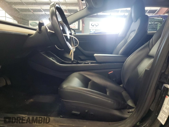 2018 Tesla Model 3 Long Range Battery z VIN 5YJ3E1EB4JF144295, wystawiony jako Copart lot #58754715 z przebiegiem 63 569 mil mil oraz Tytuł czysty. Historia ofert i sprzedaży dostępna na DreamBid. Obrazek 7.