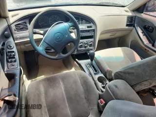 2001 Hyundai Elantra GLS z VIN KMHDN45D61U132398, wystawiony jako Copart lot #61164165 z przebiegiem 162 729 mil mil oraz Szkoda całkowita • Salvage title. Historia ofert i sprzedaży dostępna na DreamBid. Obrazek 8.