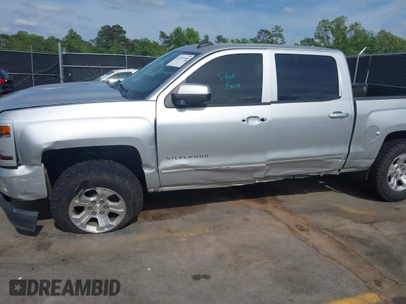 2017 Chevrolet Silverado 1500 LT with VIN 3GCUKREC5HG285689, listed as a IAAI auction lot 42055959 with 128,237 mi miles and . Bid and sale history available at DreamBid. Image 6.