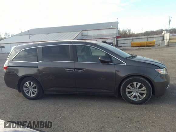 2014 Honda Odyssey EX-L with VIN 5FNRL5H64EB037646, listed as a IAAI auction lot 41786768 with 116,491 mi miles and . Bid and sale history available at carsss.com. Image 13.