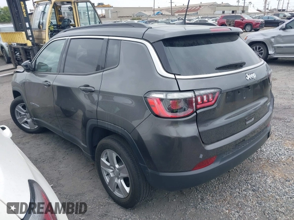 2022 Jeep Compass Latitude with VIN 3C4NJCBB8NT188411, listed as a IAAI auction lot 42011145 with 14,629 mi miles and . Bid and sale history available at DreamBid. Image 3.