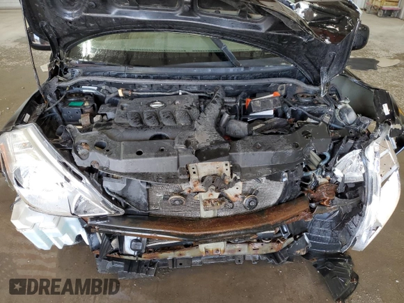 2007 Nissan Versa S z VIN 3N1BC13E47L404125, wystawiony jako Copart lot #57893205 z przebiegiem Nie podano mil oraz Szkoda całkowita • Salvage title. Historia ofert i sprzedaży dostępna na DreamBid. Obrazek 11.