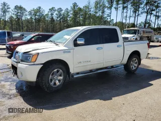 2013 Nissan Titan SL with VIN 1N6BA0ED9DN311112, listed as a Copart auction lot 48216795 with 190,666 mi miles and Salvage title. Bid and sale history available at DreamBid. Image 1.