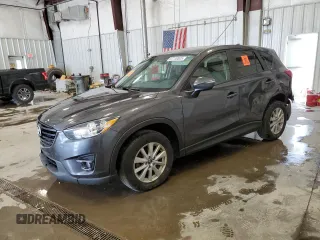 2016 Mazda CX-5 Touring z VIN JM3KE4CY3G0887033, wystawiony jako Copart lot #57110525 z przebiegiem Nie podano mil oraz Nie do naprawy • Non repairable. Historia ofert i sprzedaży dostępna na DreamBid. Obrazek 1.
