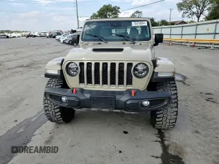 2020 Jeep Gladiator Mojave z VIN 1C6JJTEG9LL208154, wystawiony jako Copart lot #70474844 z przebiegiem 31 065 mil mil oraz Szkoda całkowita • Salvage title. Historia ofert i sprzedaży dostępna na DreamBid. Obrazek 14.