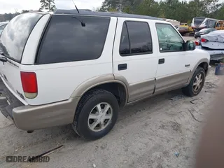 2001 Oldsmobile Bravada with VIN 1GHDT13W512122383, listed as a IAAI auction lot 41624026 with 176,973 mi miles. Bid and sale history available at carsss.com. Image 4.