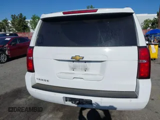 2020 Chevrolet Tahoe LT with VIN 1GNSCBKC0LR195687, listed as a IAAI auction lot 42620344 with 48,059 mi miles and . Bid and sale history available at DreamBid. Image 17.