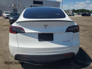 2022 Tesla Model Y Performance with VIN 7SAYGDEF9NF372337, listed as a Copart auction lot 55889345 with 51,099 mi miles and Salvage title. Bid and sale history available at DreamBid. Image 6.