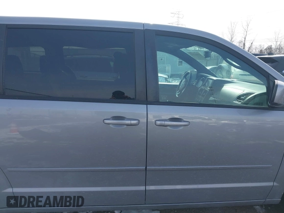 2015 Dodge Grand Caravan SE with VIN 2C4RDGBG3FR653239, listed as a IAAI auction lot 41607222 with 124,732 mi miles and . Bid and sale history available at DreamBid. Image 13.