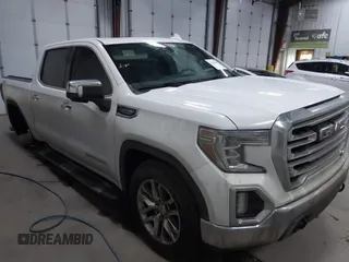 2020 GMC Sierra 1500 SLT z VIN 1GTU9DED0LZ110945, wystawiony jako IAAI lot #41630348 z przebiegiem 123 849 mil mil oraz . Historia ofert i sprzedaży dostępna na DreamBid. Obrazek 1.