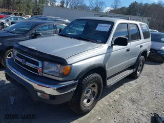 2000 Toyota 4Runner with VIN JT3GM84R7Y0063428, listed as a IAAI auction lot 41615410 with 276,948 mi miles. Bid and sale history available at carsss.com. Image 2.